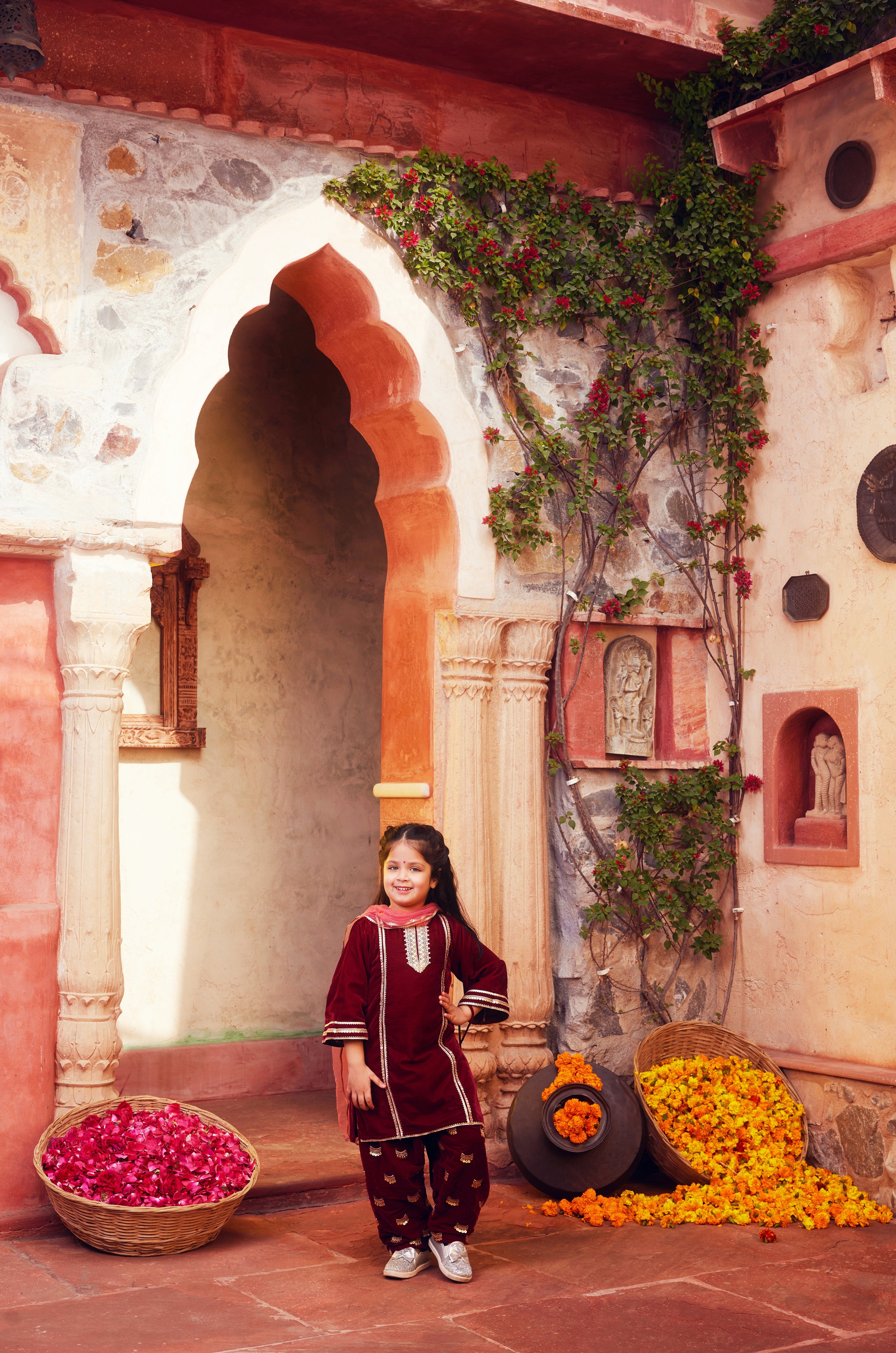 Maroon kurta with matching salwar and dupatta