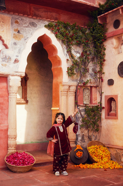 Maroon kurta with matching salwar and dupatta
