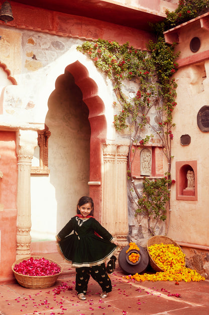 Dark Green kurta with matching salwar and dupatta