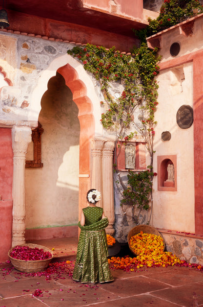 Green brocade lehenga with matching choli and dupatta