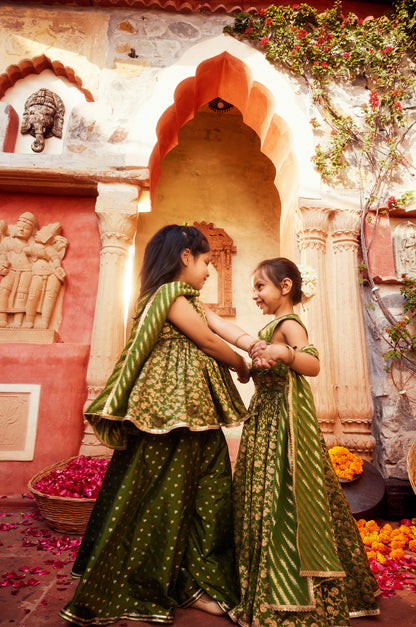 Green brocade lehenga with matching choli and dupatta