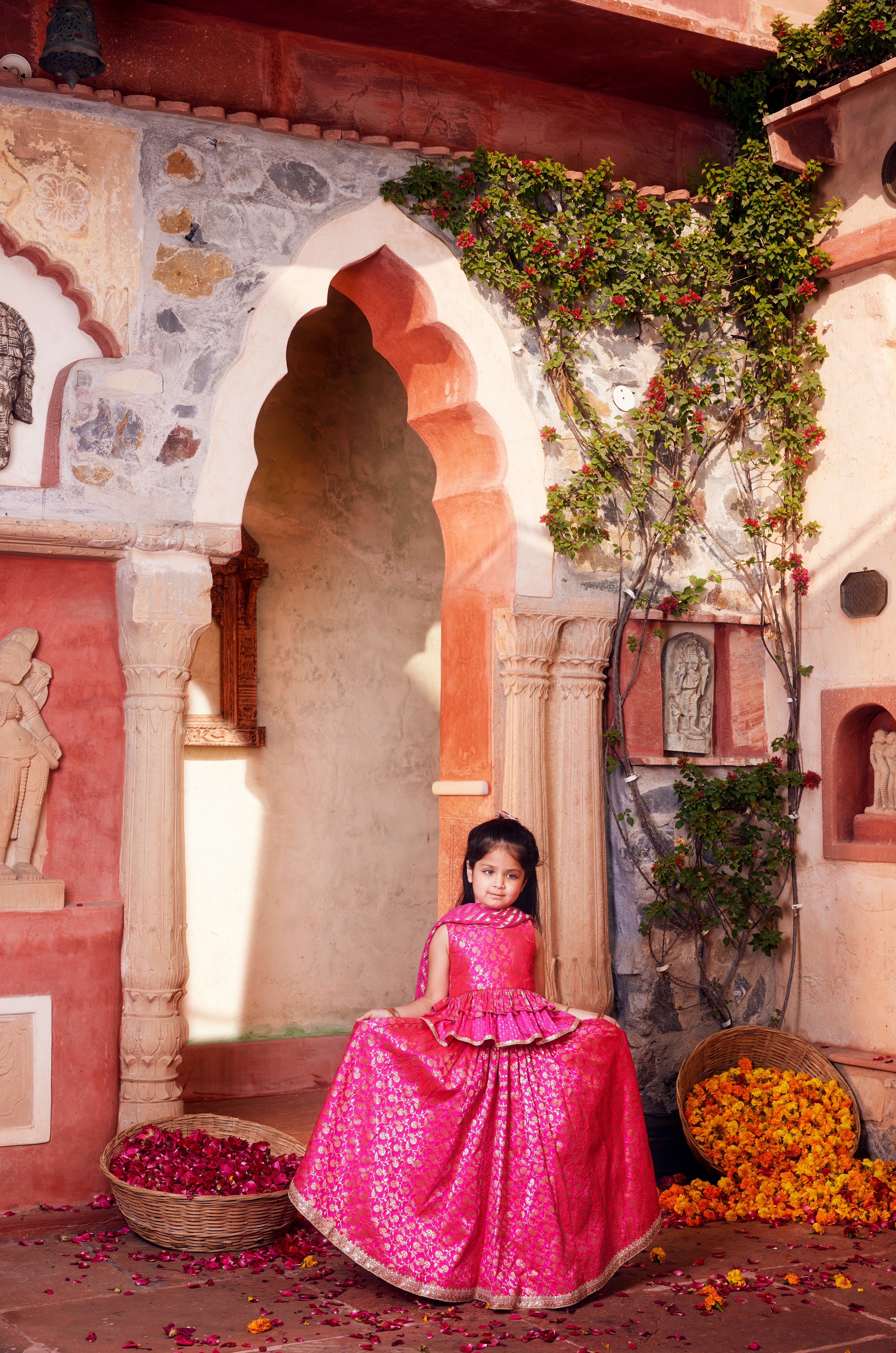 Pink brocade lehenga with matching choli and dupatta