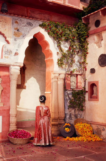 Orange brocade Lehenga with matching Choli and dupatta
